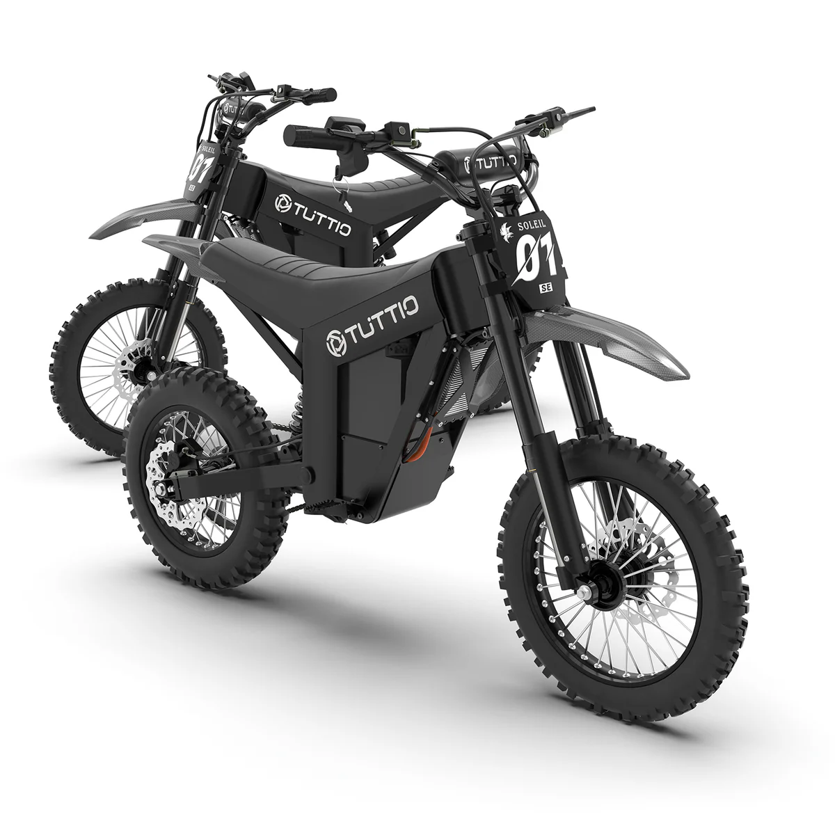 A pair of black TUTTIO electric dirt bikes with '01 SE' number plates, shown in a front three-quarter view on a white studio background.