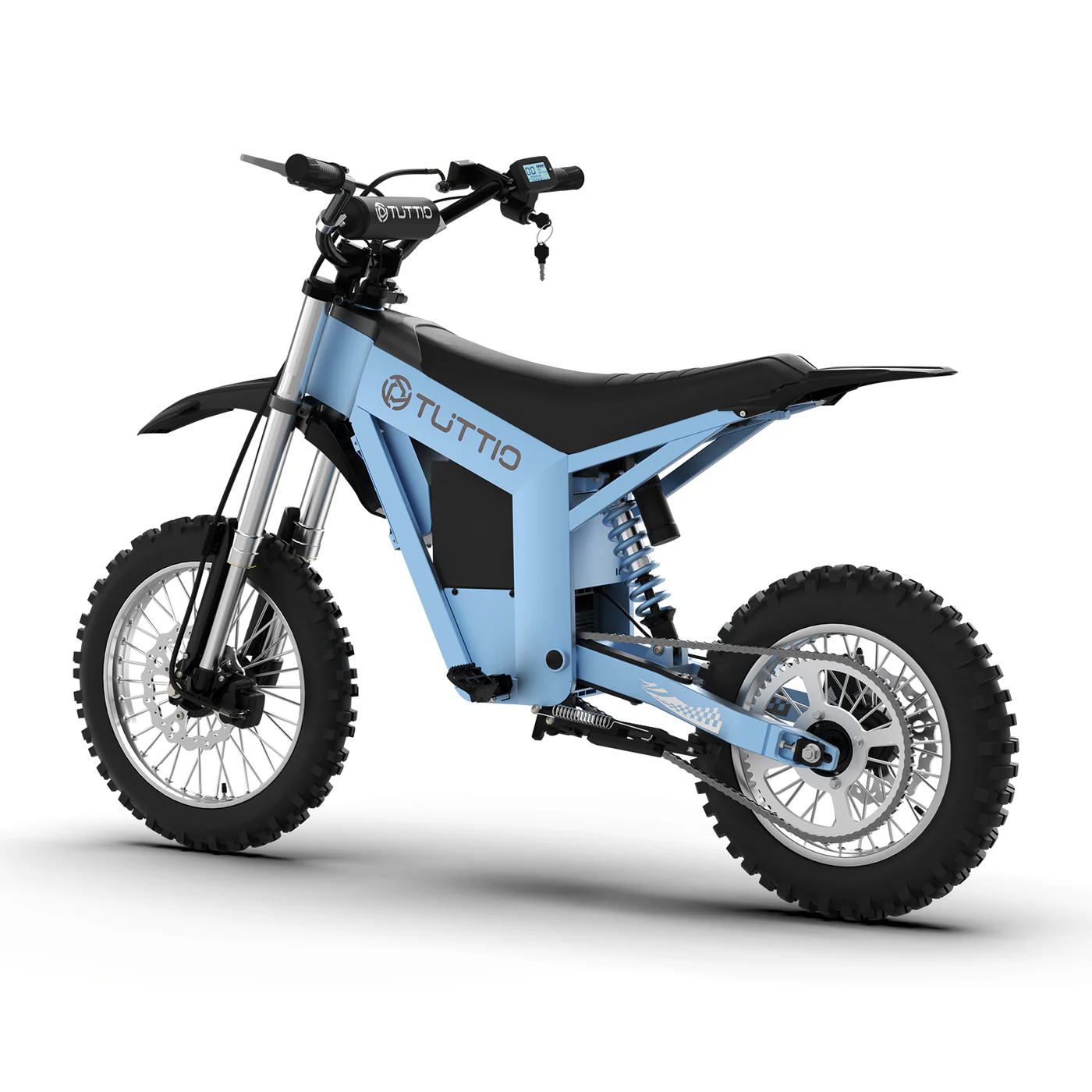 A clear studio shot on a seamless white background revealing the left rear three-quarter angle of the light blue Tuttio Soleil01 GB electric dirt bike, highlighting its rear suspension, chain drive system, and rugged off-road tires.