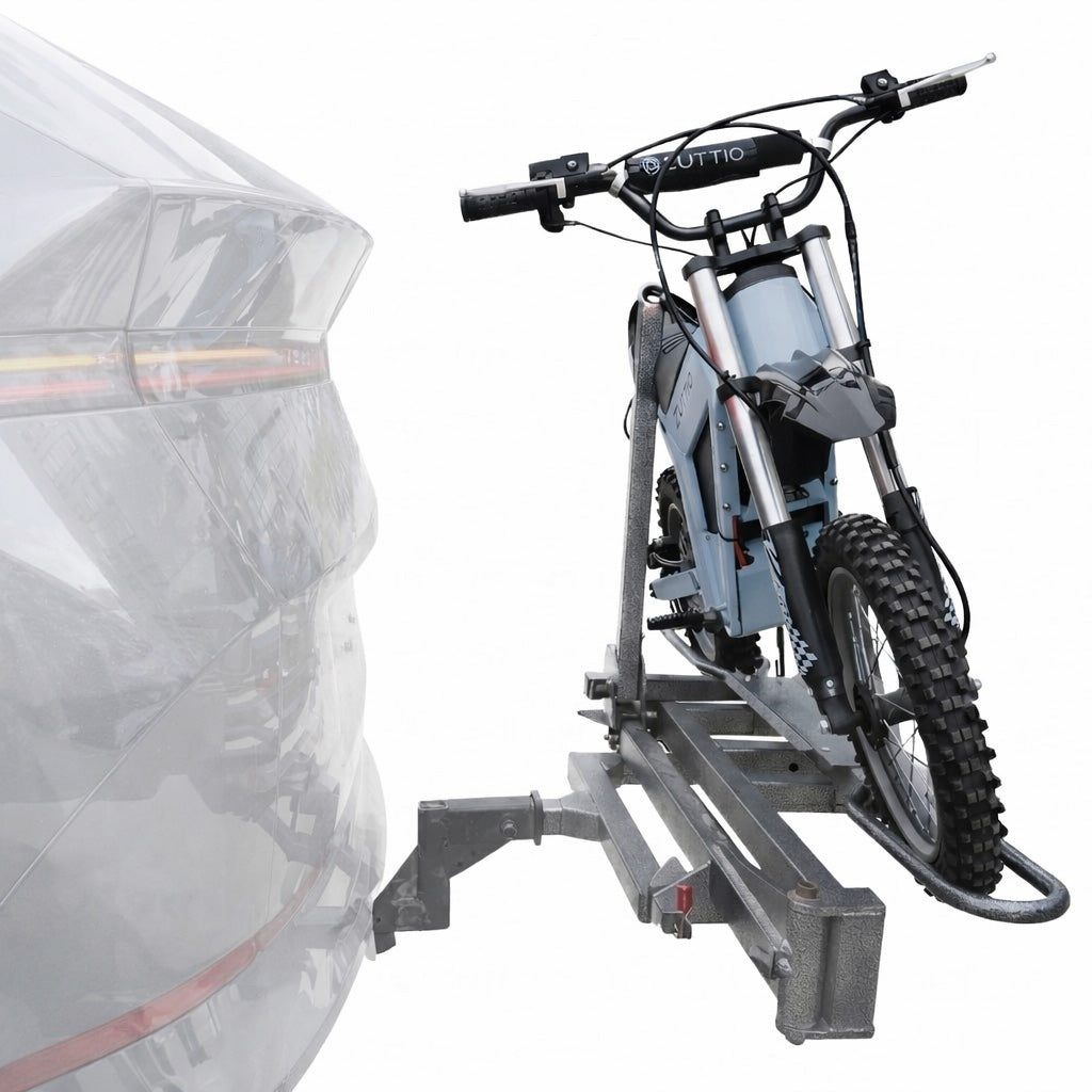 Electric bike securely mounted on hitch carrier rack attached to vehicle hitch