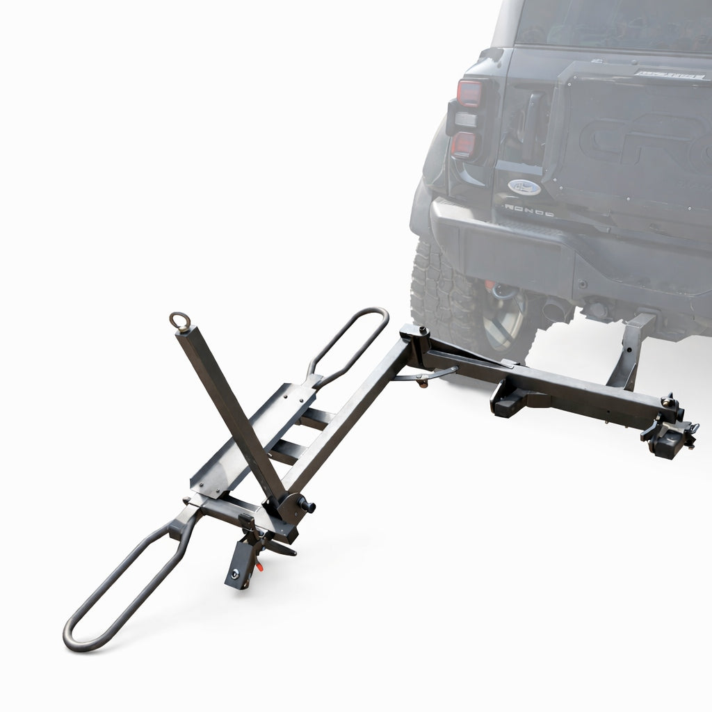 Tilting hitch mounted bike carrier rack in loading position for easy ground level bike loading
