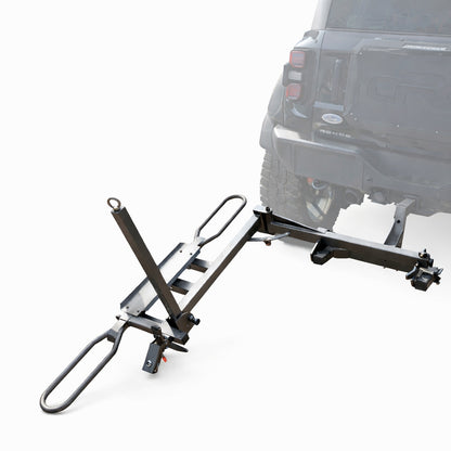 Tilting hitch mounted bike carrier rack in loading position for easy ground level bike loading