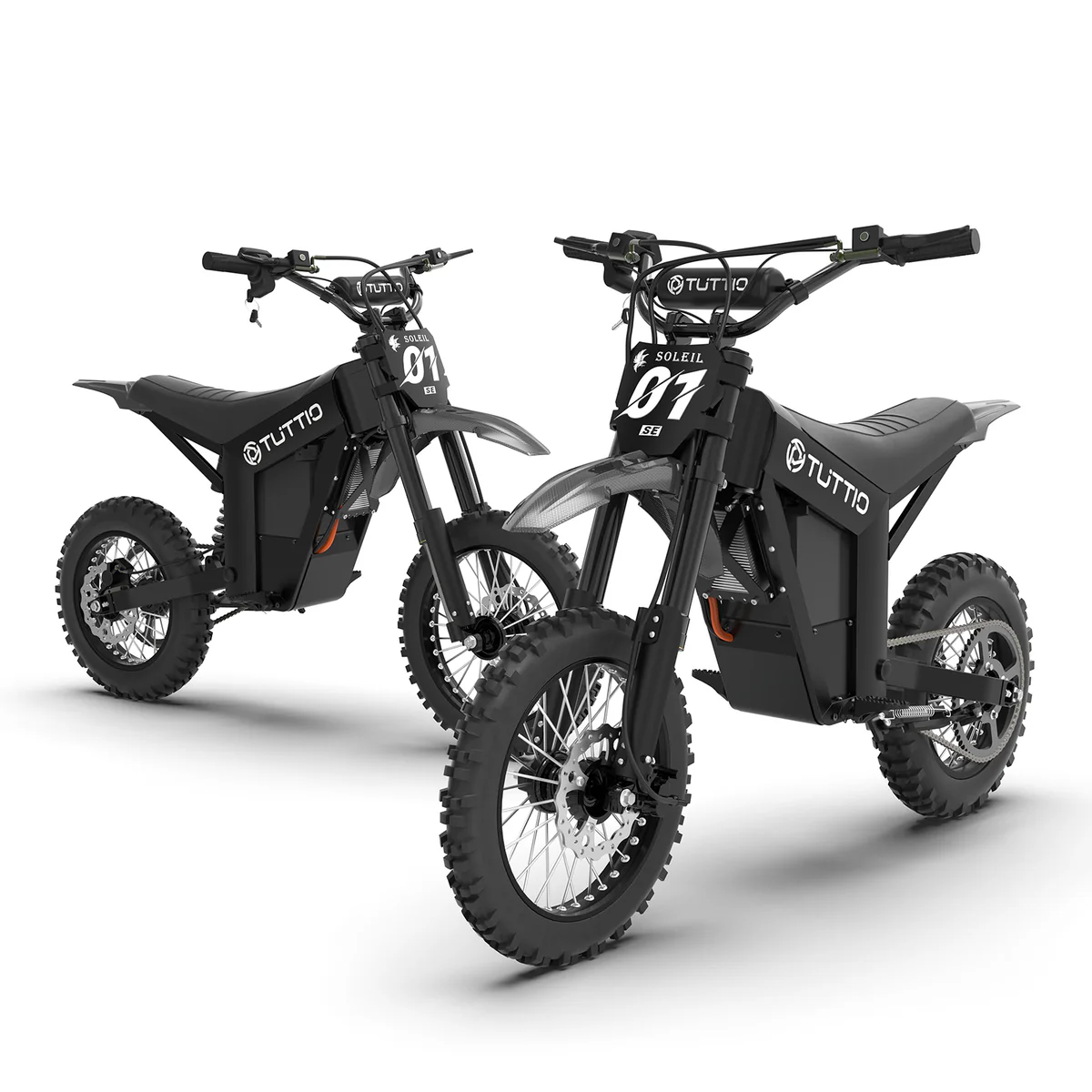 Studio shot of two black TUTTIO electric dirt bikes, angled to show the '01 SE' racing plates and long-travel front suspension