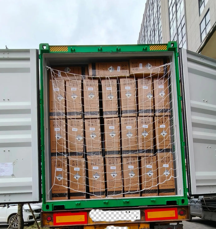 TuttioMake Soleil01 SE electric mini bikes secured in a shipping container for EU warehouse delivery